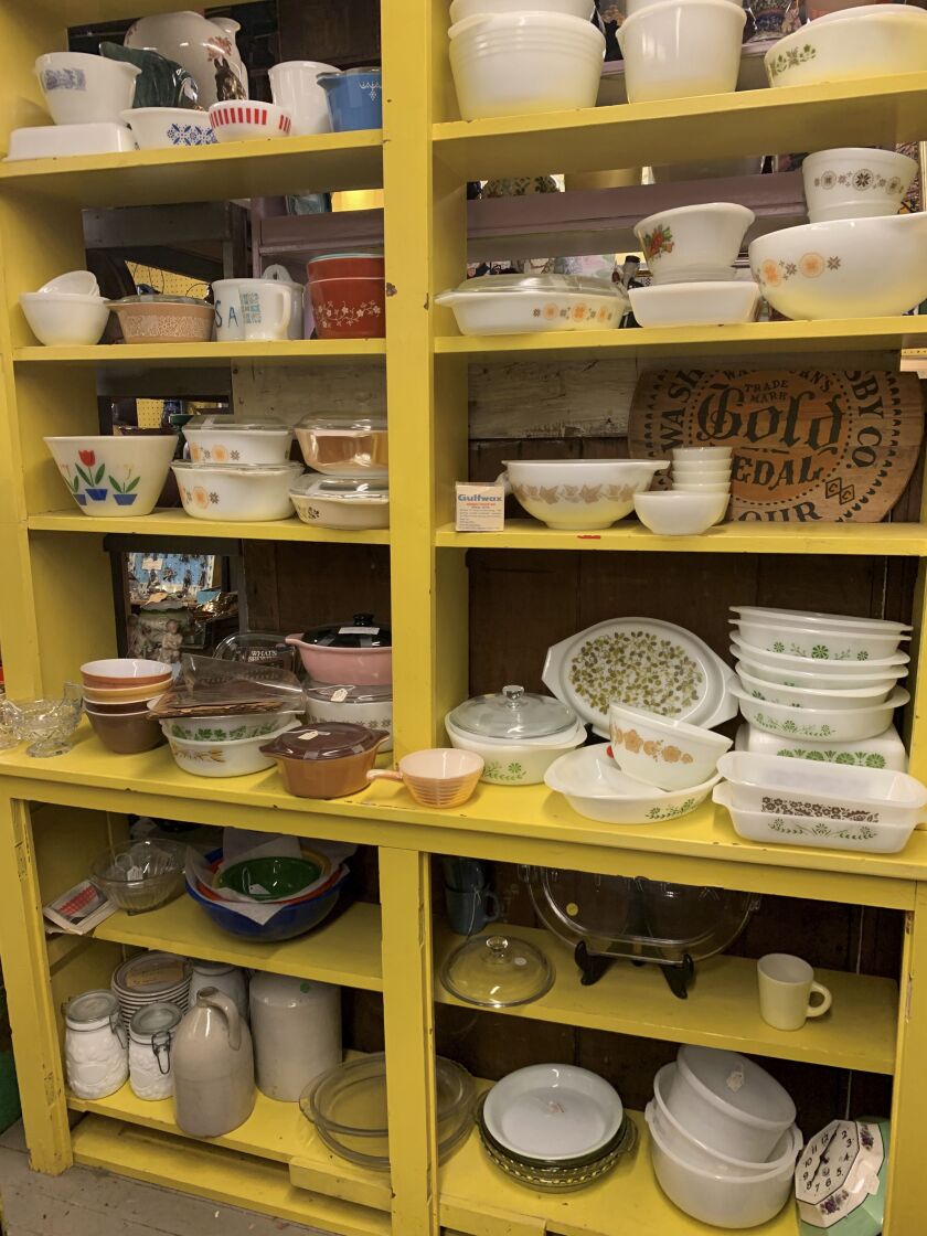 This image provided by Tracee Herbaugh shows one area of vintage dishes for sale at “Downstairs at Felton Antiques” in Waltham, Massachusetts. Some collectors buy vintage dishware to try to re-sell it at a profit, while others are in it for nostalgia